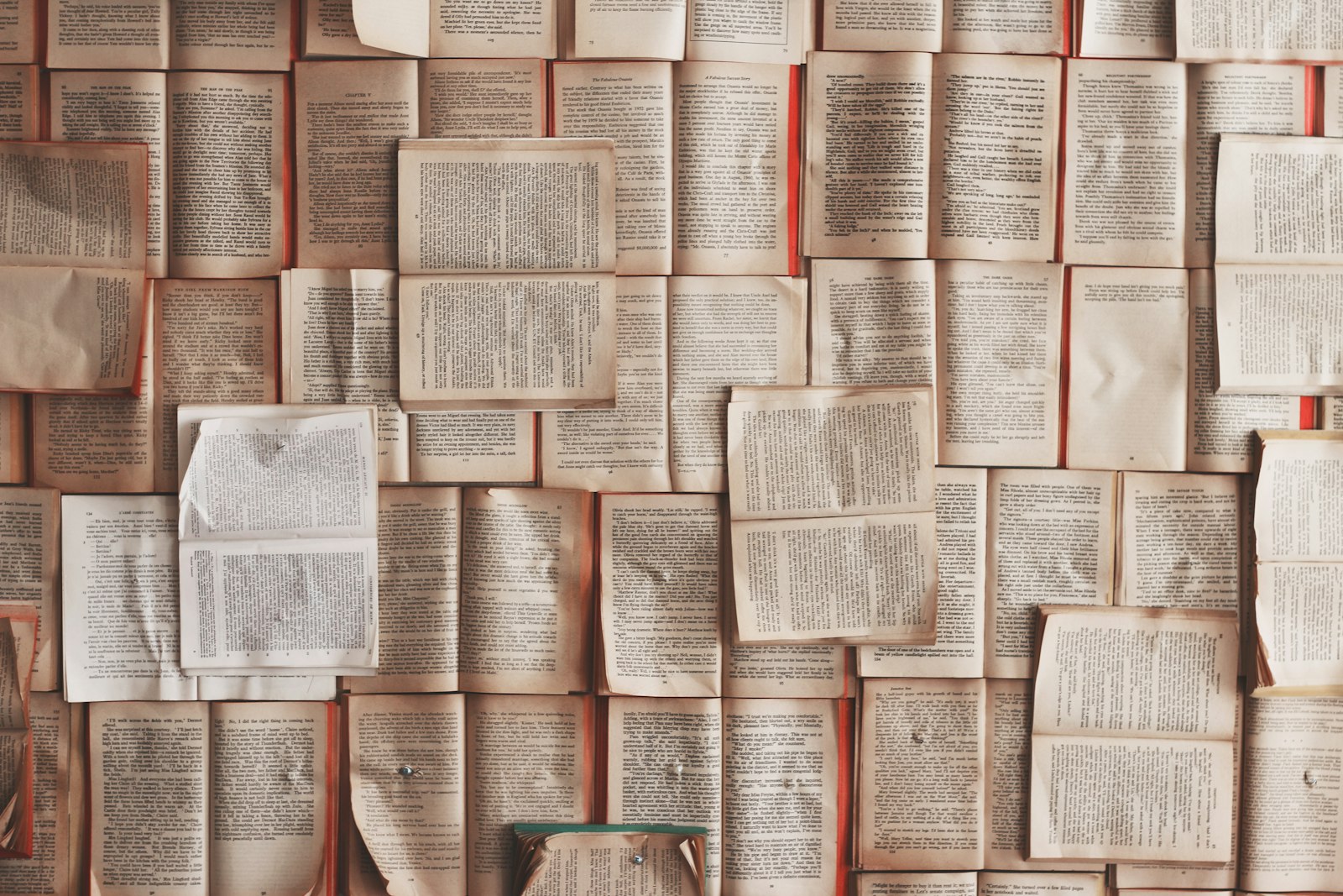 Wall collaged with printed journal pages